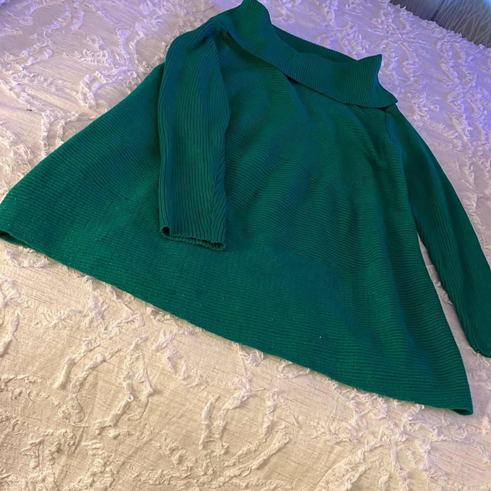 Green sweater with gold flecks of sparkles